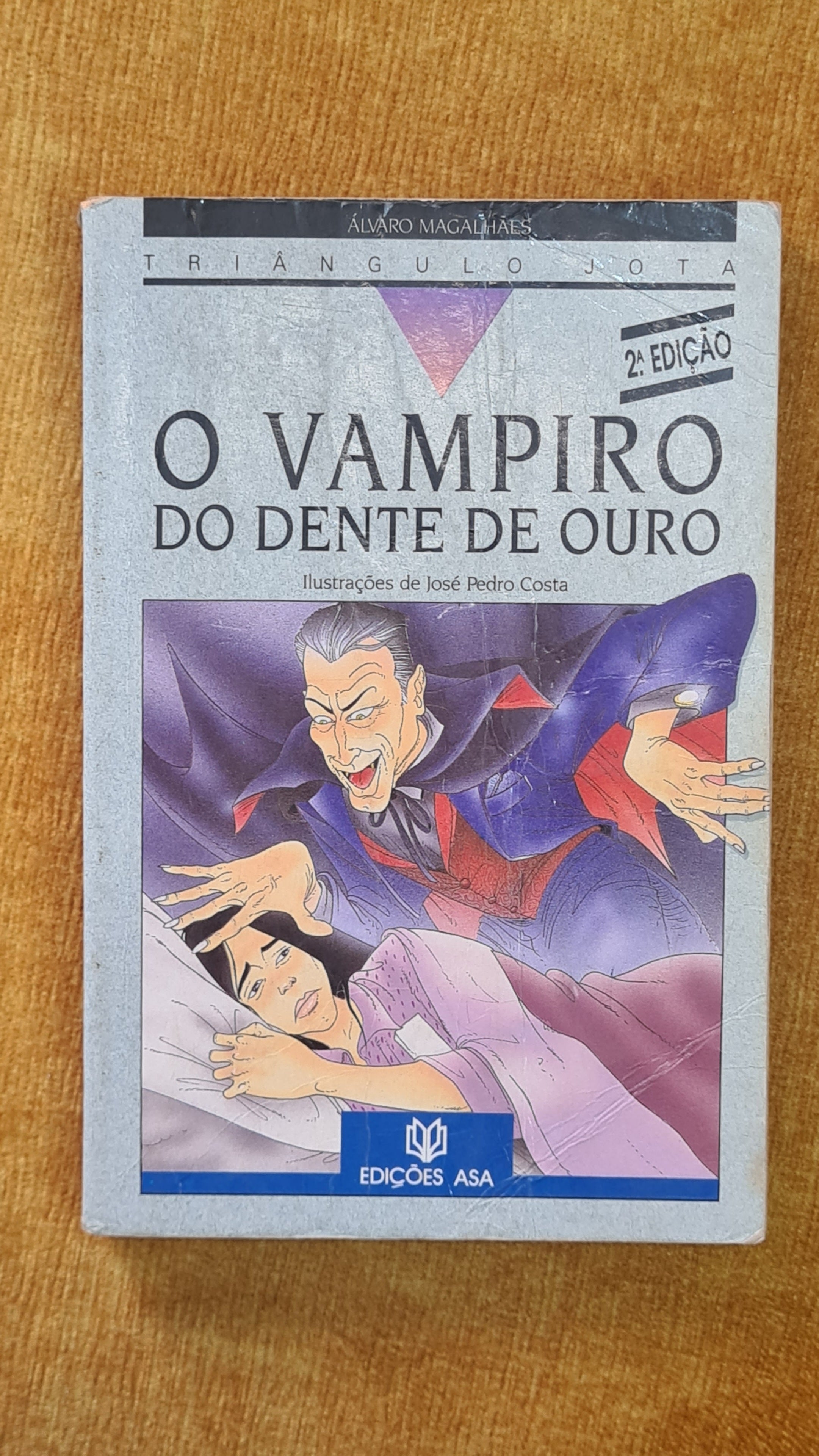 The Vampire with the Golden Tooth - Triangle Jota 6