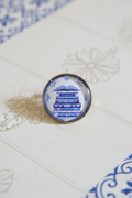 Pin pilha de livros azulejo com fundo turístico